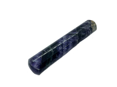 GEMSCITE Gemstone wand resting beside altar supports Feng Shui and mindful breathing.