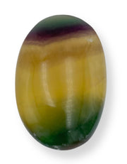 GEMSCITE Multi Fluorite palm stone closeup for focused meditation and relaxation.