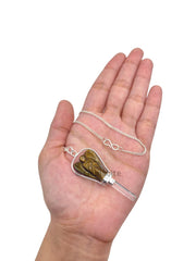 Two pendants in a soft pouch, gift-ready from GEMSCITE