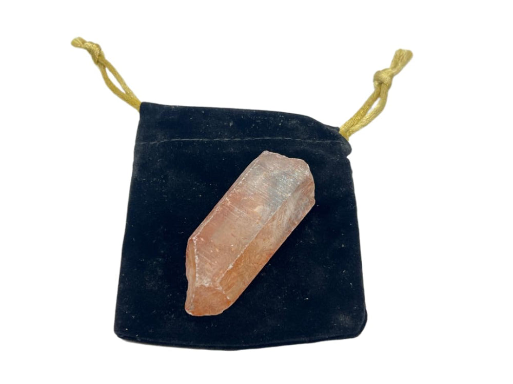 GEMSCITE red Lemurian seed crystal quartz, two-to-three inches, supports balanced energy and focus.