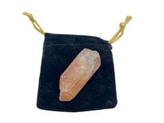 GEMSCITE red Lemurian seed crystal quartz, two-to-three inches, supports balanced energy and focus.