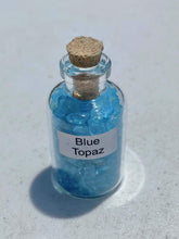 Generic Blue Topaz Crystal Mini Bottle with cork stopper for portable display.