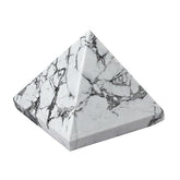 Generic Howlite crystal pyramid centerpiece for calming energy at home.