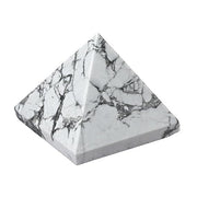Generic Howlite crystal pyramid centerpiece for calming energy at home.