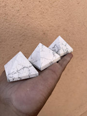 Generic Howlite pyramid on altar or grid for serene rituals.