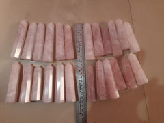Generic Natural Rose Quartz Crystal Wand for calming rituals and balance.