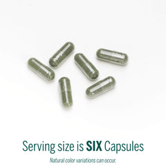Genestra Phyto Greens Capsules pouring shot suggests easy daily use in a routine.