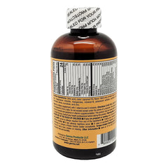 Germa B-Complex Syrup bottle pour showing smooth orange taste.