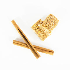 GLP-1Care Cinnamon Protein Bar on desk offers quick, satisfying snack.