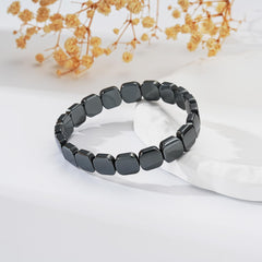 Gnamy Hematite Bracelet stretch band on wrist for versatile daily wear.