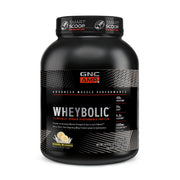 GNC AMP Wheybolic banana milkshake powder tub showing flavor and serving use