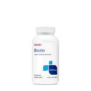 GNC Biotin 2500mcg bottle with capsules supporting healthy hair, skin, and nails.