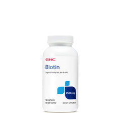 GNC Biotin 2500mcg bottle with capsules supporting healthy hair, skin, and nails.