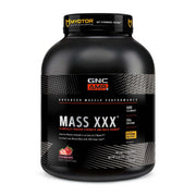 GNC AMP Mass XXX strawberry bottle for convenient mass-building support.