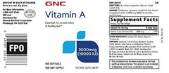 Closeup of GNC Vitamin A softgels emphasizing daily use for skin and vision.