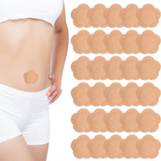 Gosknor castor oil pack wrap belly-button closeup showing skin-friendly adhesive.