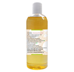 Dropper filled with arnica oil for easy application.
