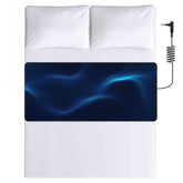 Grounded Therapy grounding mat on a bed shows a sleep-ready seamless fit.