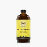 Gye Nyame Black Seed Bitters with Moringa bottle ready for a daily detox ritual.
