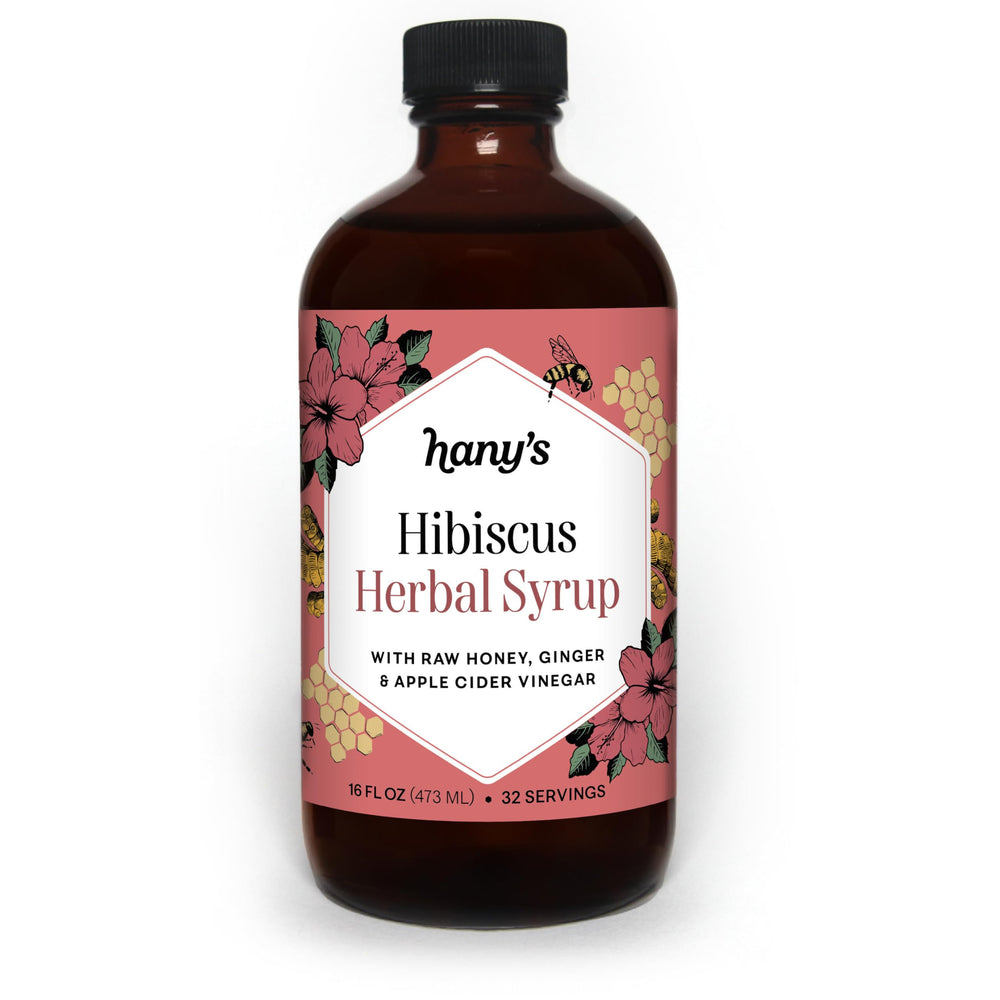 Hany's Harvest Hibiscus Ginger Syrup bottle emphasizes handcrafted wellness for daily immune support.