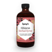Hany's Harvest Hibiscus Ginger Syrup bottle on counter for daily wellness ritual