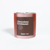 Happy Wax Chocolate Croissant candle in its jar, showcasing a warm bakery-inspired scent for cozy evenings.
