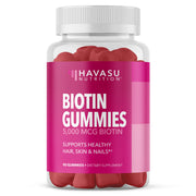 HAVASU Biotin gummies bottle promotes hair and nails support with strawberry flavor.
