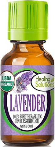 Healing Solutions lavender oil bottle demonstrates pure organic fragrance for relaxation and mood support.
