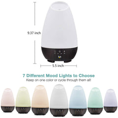 HealthSmart diffuser with wood-grain base complements modern living room decor.