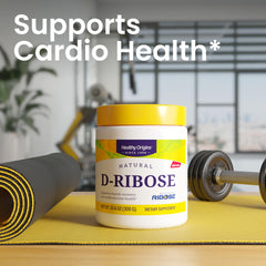 D-Ribose powder poured into a glass of water for quick hydration and intake.