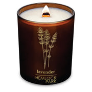 Hemlock Park Amber & Gold candle closeup with a steady wood wick burn.