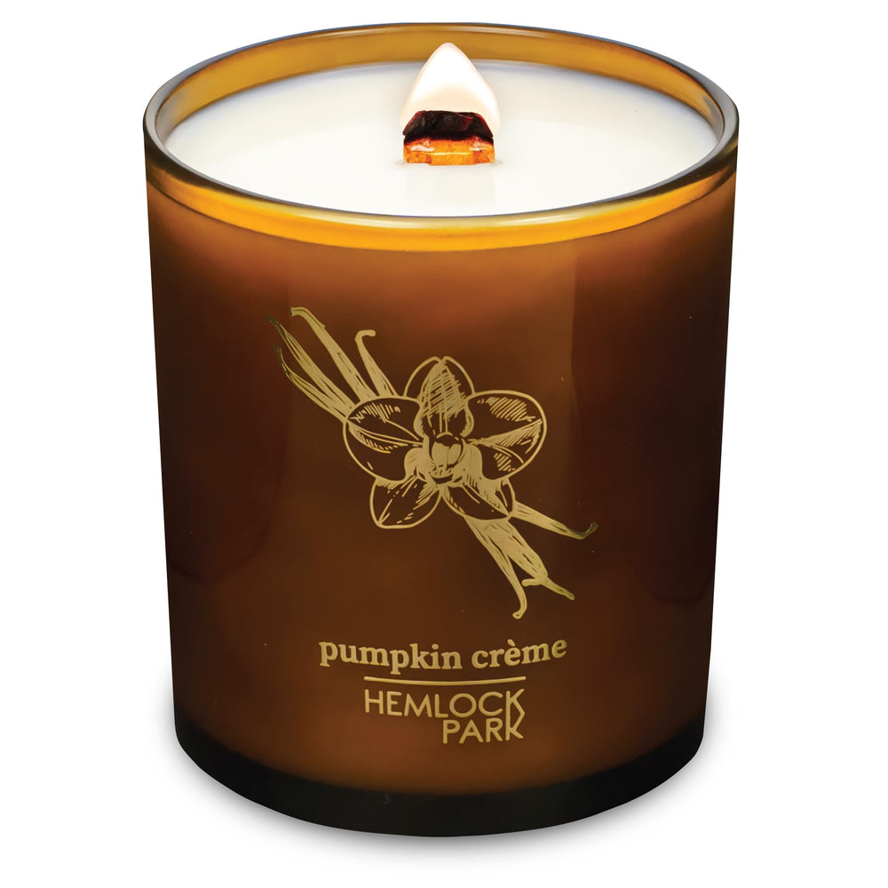 Hemlock Park Amber & Gold Wood Wick Candle in 14 oz creates cozy autumn ambiance with coconut wax
