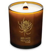 Hemlock Park Amber & Gold candle with label, showcasing natural coconut wax for a calming home ambiance.
