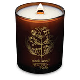 Hemlock Park Amber & Gold Wood Wick Candle jar with warm amber glow and subtle aroma.