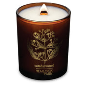 Hemlock Park Amber & Gold Wood Wick Candle jar with warm amber glow and subtle aroma.