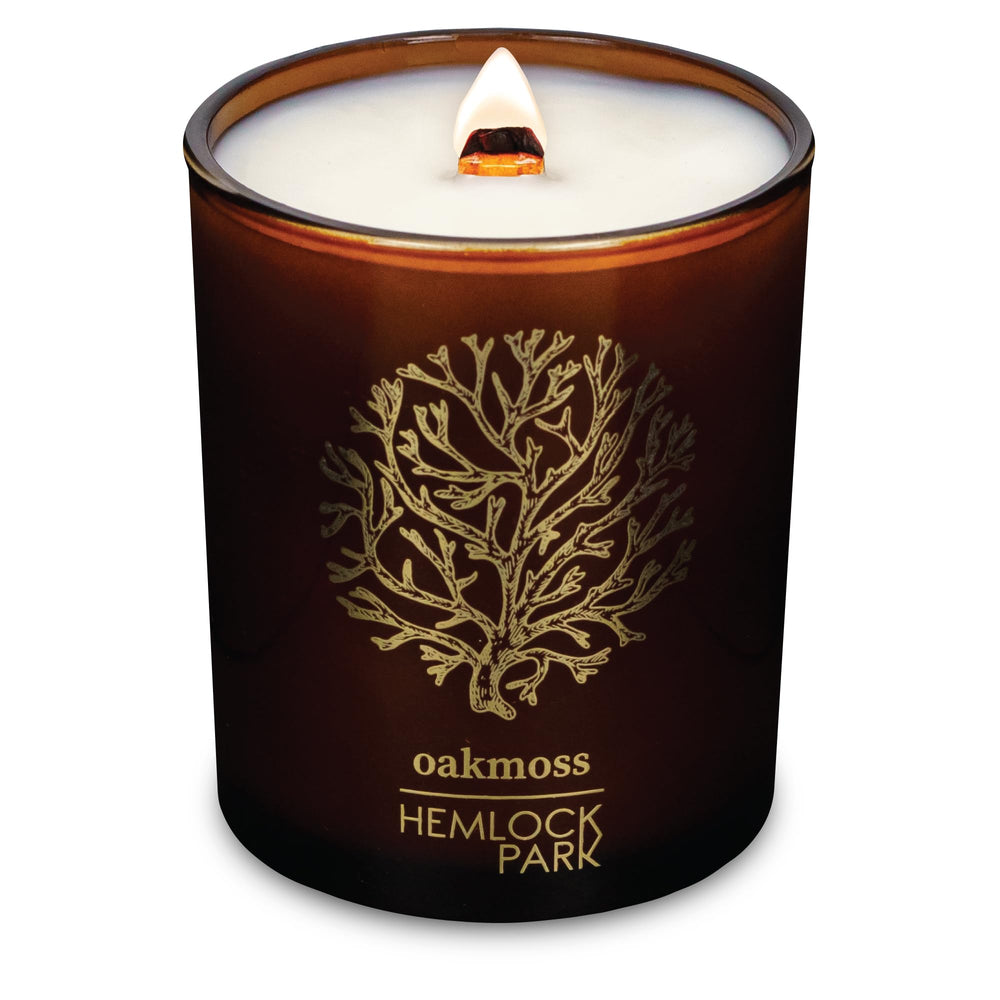 Hemlock Park Amber & Gold candle with wood wick delivers a steady, cozy glow.