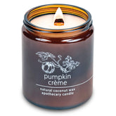 Hemlock Park crackling wick candle with pumpkin creme aroma for cozy nights.