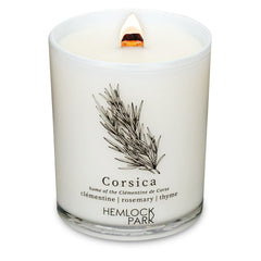 Hemlock Park passport candle with crackling wood wick for cozy travel ambiance.