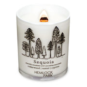 Hemlock Park travel-inspired candle with Sequoia-Cedarwood scent and crackling wood wick for cozy ambience.