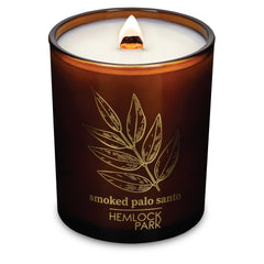 Hemlock Park wood wick candle closeup enhances cozy evenings with steady flame.