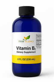 Herb-Science Vitamin B2 drops bottle pour, convenient energy support.
