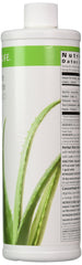 Pouring Herbal Aloe Mango concentrate into a glass for a refreshing sip.
