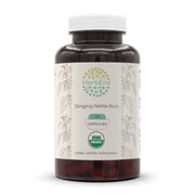 HerbEra stinging nettle root capsules bottle on table for a daily herbal routine.