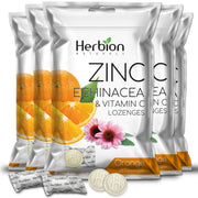 HERBION Naturals zinc echinacea vitamin C lozenges orange bottle for family daily wellness.