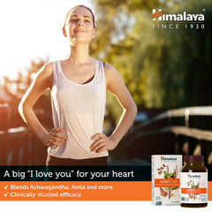 Himalaya HeartCare capsules close-up shows Ashwagandha and Amla in vegan form.