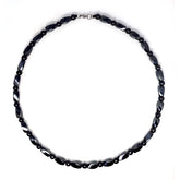 Hion magnetic therapy necklace with black obsidian beads for grounding and daily style.