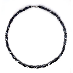Hion magnetic therapy necklace with black obsidian beads for grounding and daily style.