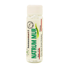 Homeomart Natrum Muriaticum pellets 200C glass vial close-up.