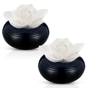 Honeydak Camellia diffuser with ceramic rose-top releasing a gentle aroma