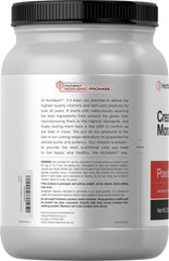 Horbäach Creatine Monohydrate powder being poured into a glass for easy mixing.